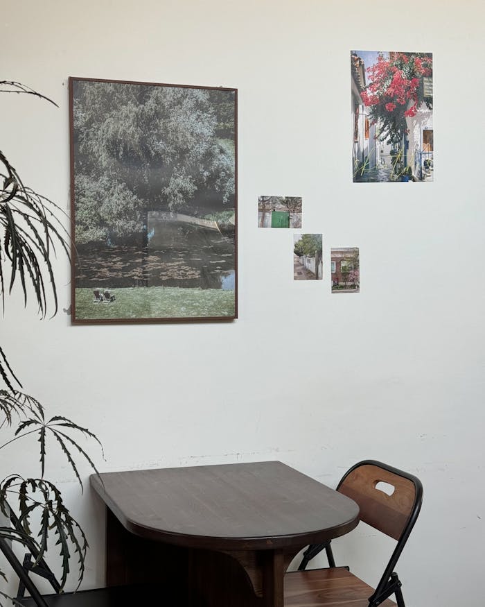 Cozy interior with wall art and a wooden table hinting at tranquility.